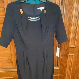 Studio one black dress with attached gold necklace accent